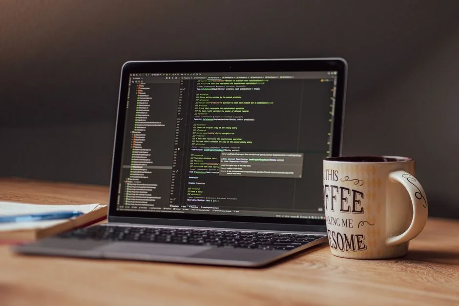 A modern computer screen displaying web design work, showcasing creative visuals in a workspace.